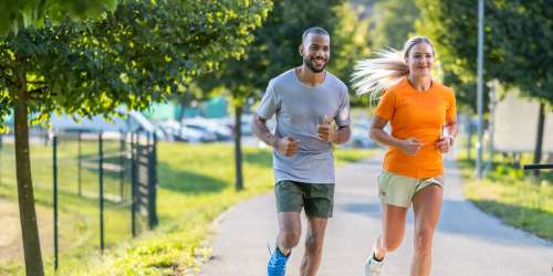 Resident couple jogging near Lindberg Apartments in McAllen, Texas