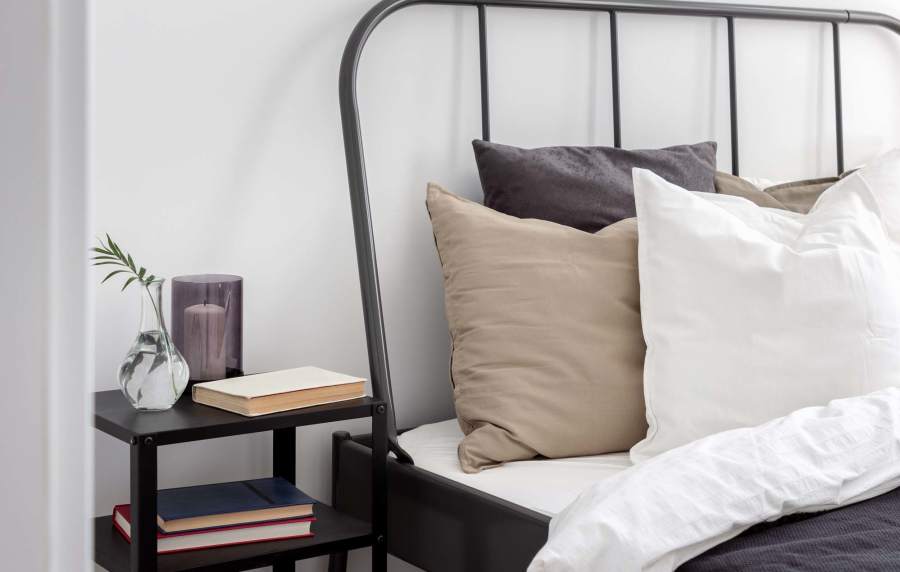 Elegant bedroom with ample light at EVOQ East Cobb in Marietta, Georgia