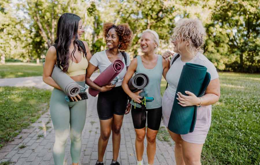 Residents with yoga mats near Rivers Edge in Lake Elsinore, California