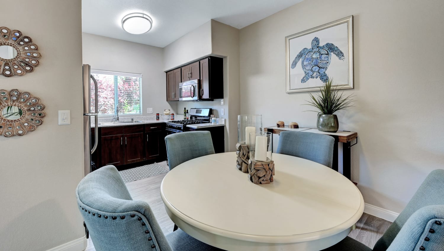 Dining area and kitchen at Horizon Ridge Apartments in Henderson, Nevada