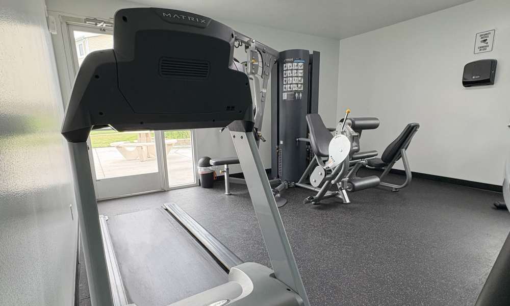 Exercise equipment in the fitness center at Elk Run Apartments in Magna, Utah