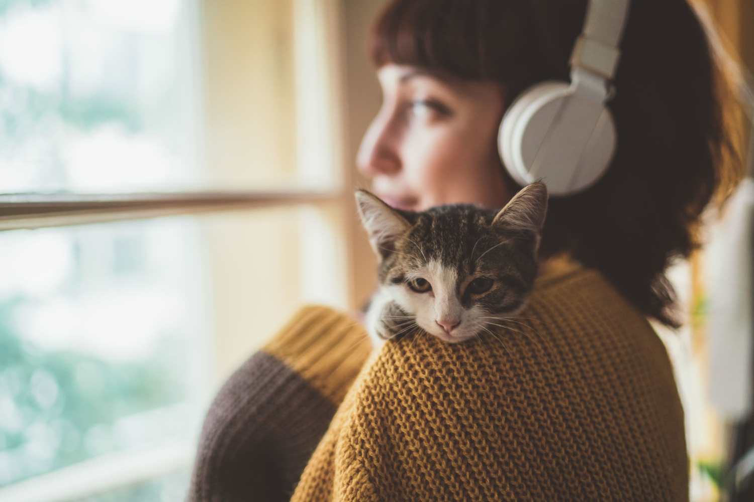Resident holding her cat in their apartment at Beverly Villas in Brunswick, Georgia