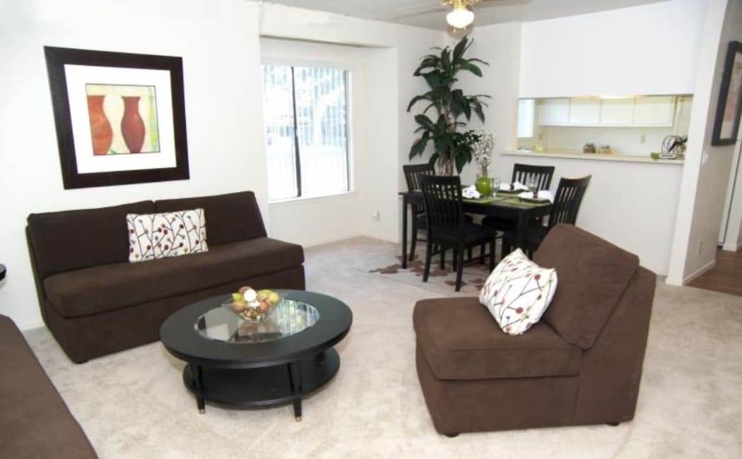 Bright and spacious living room at Waterfield Square Apartment Homes in Stockton, CA