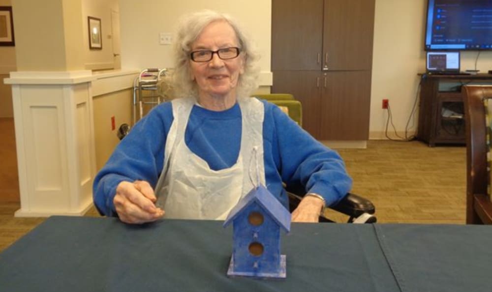 A resident making a bird house at Grace Point Place in Oak Lawn, Illinois. 