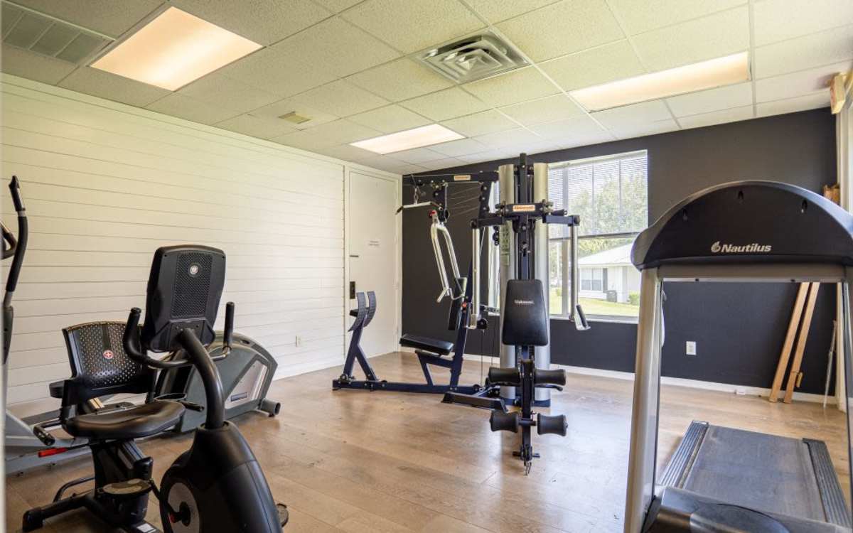 Well-equipped fitness center at Cypress Commons in Wildwood, Florida