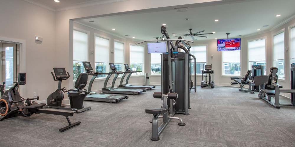 Fitness center with weight and cardio machines at Proximity New Bern in New Bern, North Carolina