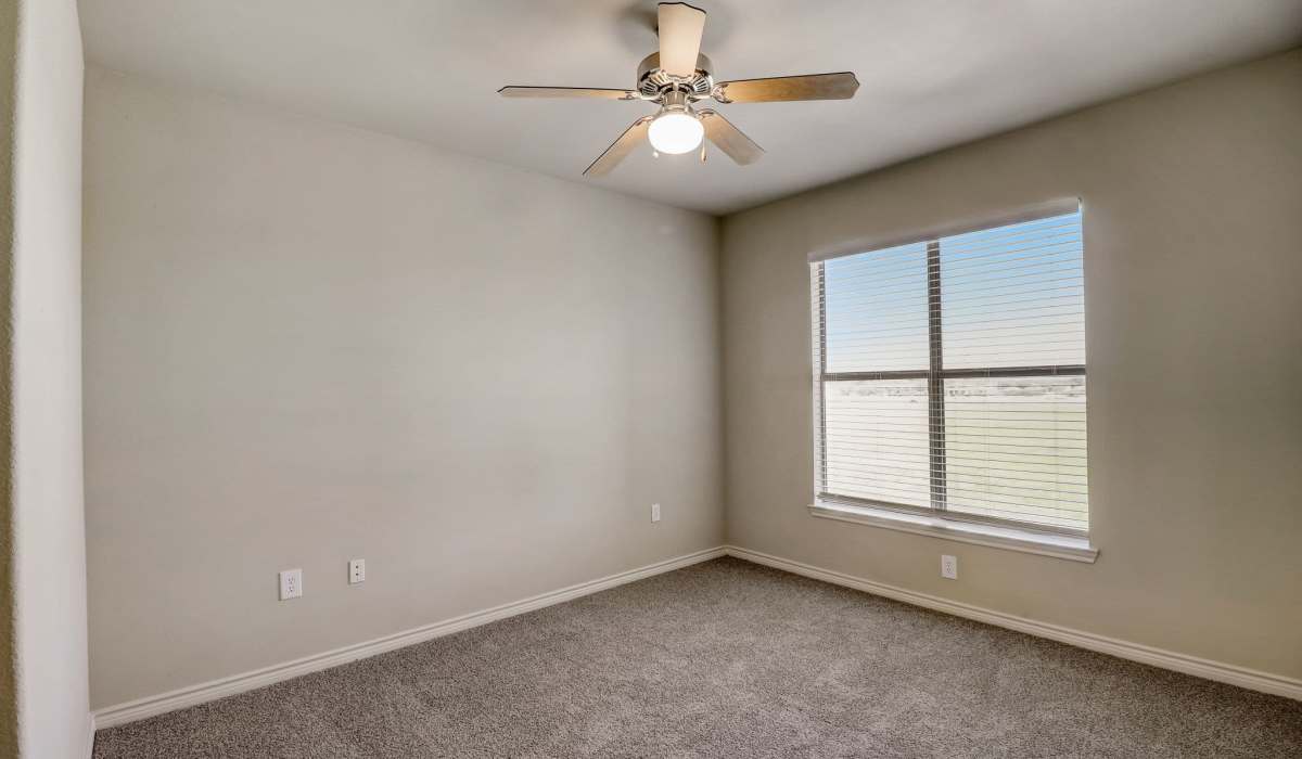Apartment interior with large window at Park Avenue at Boulder Creek in Houston, Texas