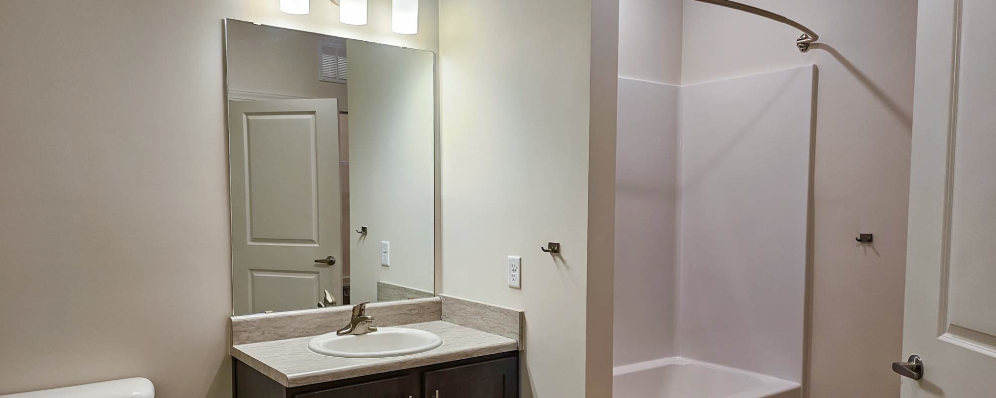 Brushed nickel fixtures in bathroom at Bridge Creek Pointe in Spartanburg, SC