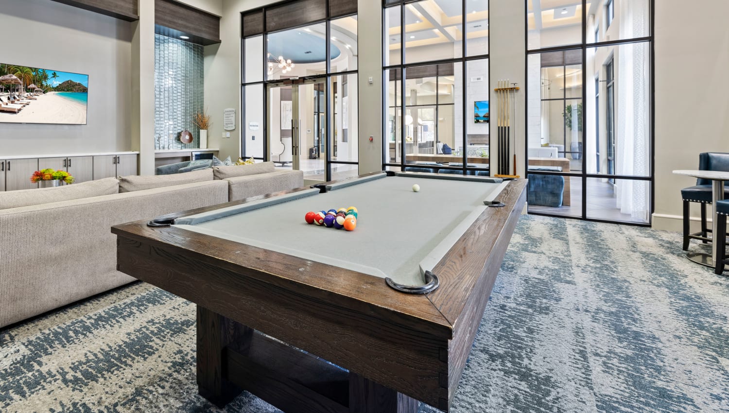 Pool table and plenty of TVs in the Clubhouse at Olympus at Memorial in Houston, Texas