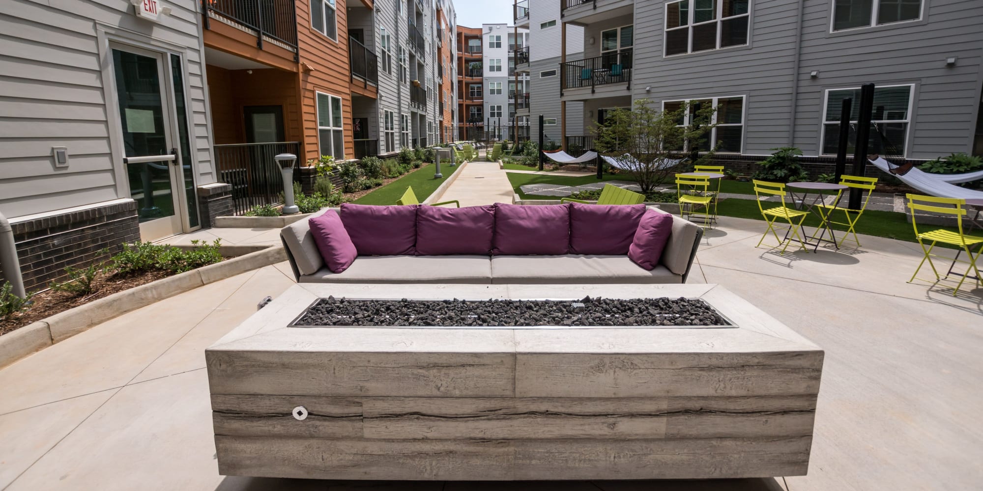 Outdoor fireplace and seating at One305 Central in Charlotte, North Carolina
