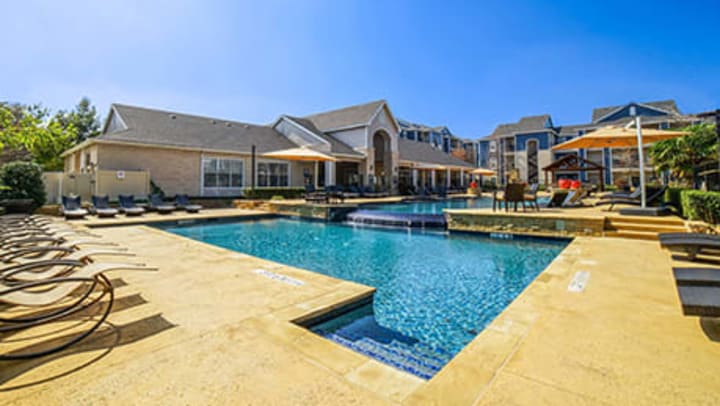 CastleRock at Denton offers a resort-style swimming pool and a suite of amenities