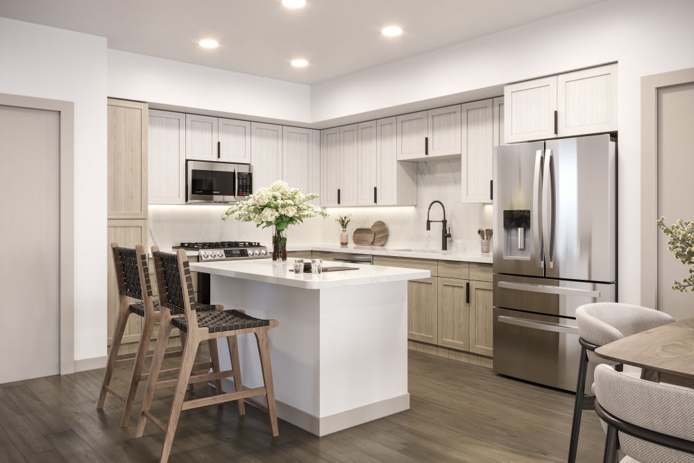 Eldorado Hills, CA Luxury Apartments for Rent - Broadstone Villas - Kitchen with White Cabinets, Stainless-Steel Appliances, and Kitchen Island
