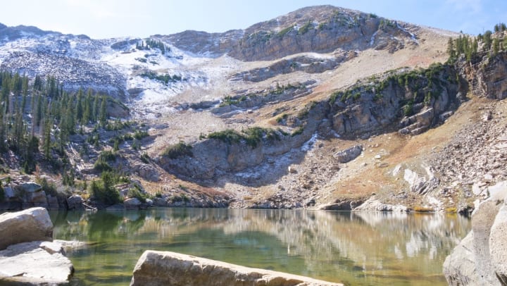 Snow on the mountains above Cecret Lake at the top of Little Cottonwood Canyon, Utah