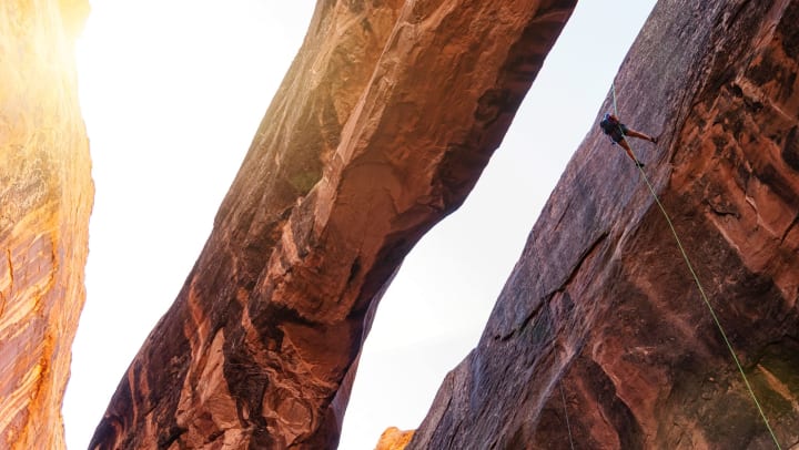 a person rock climbing in Utah