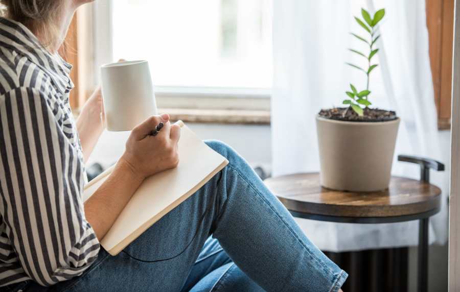 Resident reading at Seapointe Villas in Costa Mesa, California