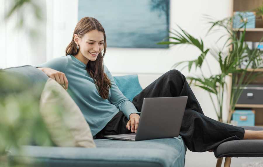 Resident working on her laptop at Mount Vernon Arms Apartments in Merrillville, Indiana