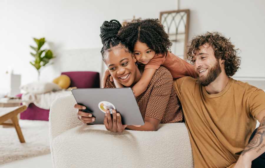 Resident family with laptop at Mount Vernon Arms Apartments in Merrillville, Indiana