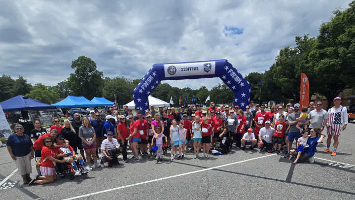 2025 22-Miles to Break Boundaries Run Participants lined up at the finish line