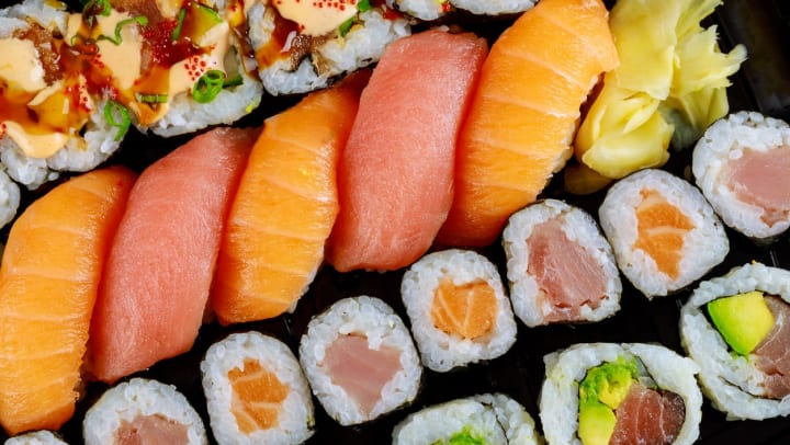 a plate of fresh sushi rolls and nigiri with ginger | sushi restaurants in Peoria
