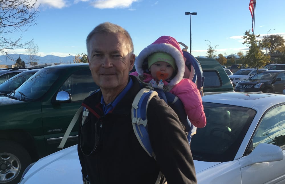 Steve from Touchmark Central Office in Beaverton, Oregon with his grandchild