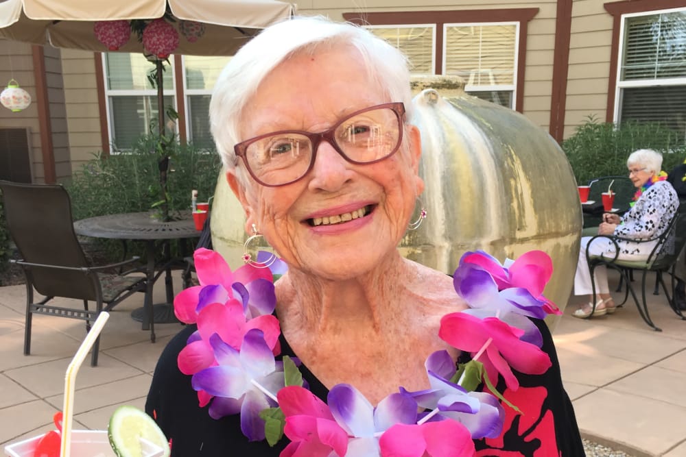 Resident at a luau event at Merrill Gardens at Gilroy in Gilroy, California. 