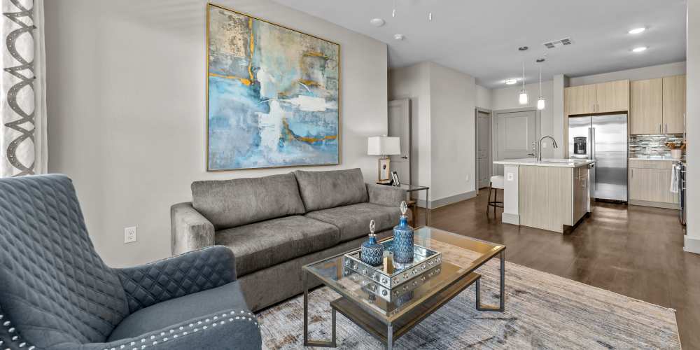 Living room with coffee table at Harbor Hill in Rockwall, Texas