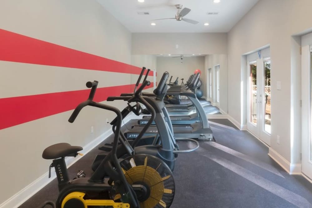 Large fitness center at The Grove at Six Hundred Apartment Homes in Rome, Georgia