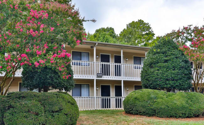 A beautifully manicured landscape at Huntersville Apartment Homes in Huntersville, North Carolina