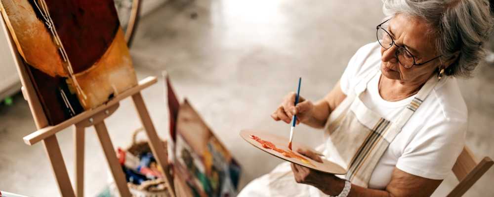 Woman painting at Corp Site Testing in Bend, Oregon