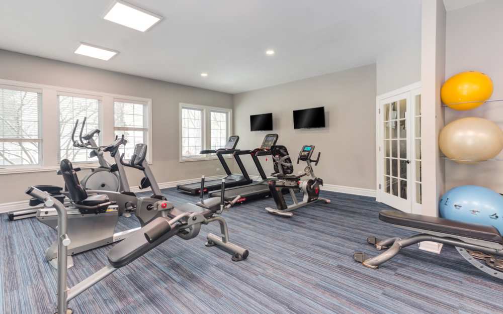 Well-equipped fitness center at The Gates of Deer Grove Apartment Homes in Palatine, Illinois