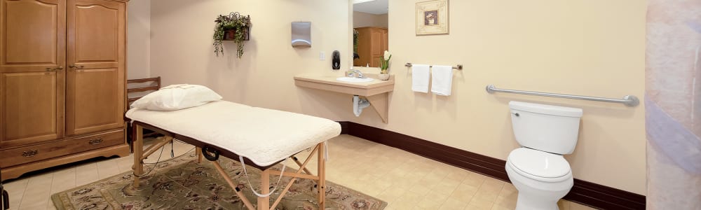 Massage table in bathroom at Bell Tower Residence Assisted Living in Merrill, Wisconsin