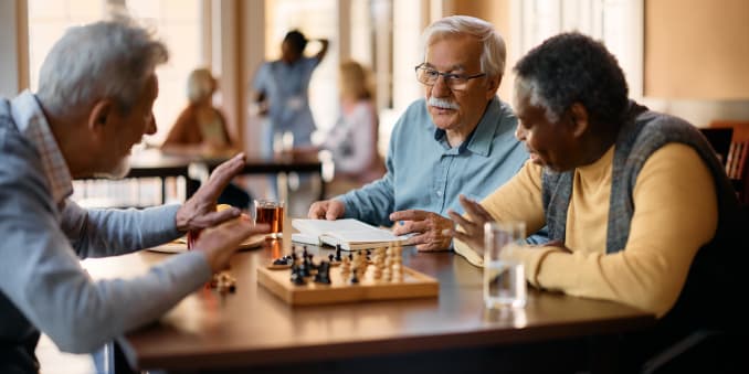 Residents playing chess at Barclay House of Aiken in Aiken, South Carolina