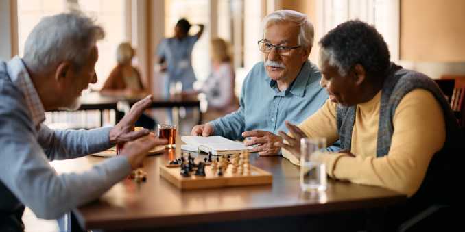 Residents playing chess at Barclay House of Baton Rouge in Baton Rouge, Louisiana