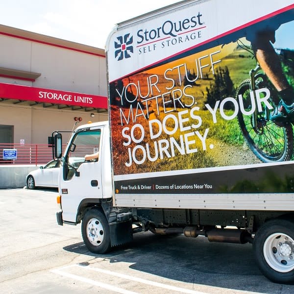 Moving truck parked outside of storage units at StorQuest Self Storage in Los Angeles, California