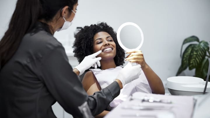 a female patient in a dentist