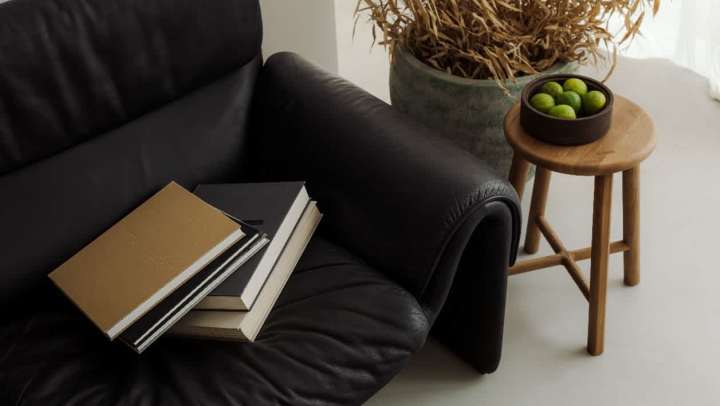 Comfortable black couch with coffee table