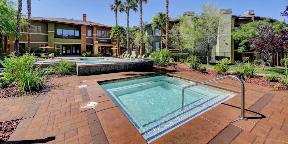 Hot tub and sparkling pool at Falling Water Apartments in Las Vegas, Nevada