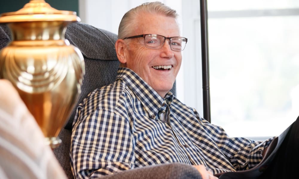 A smiling resident at Touchmark at Wedgewood in Edmonton, Alberta