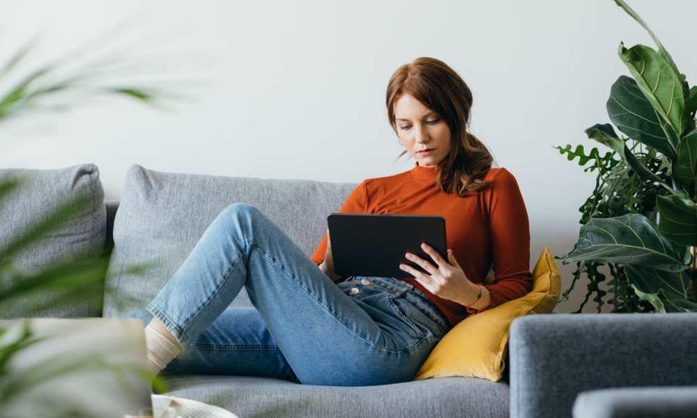 Resident checking out our online resources from her new apartment at Willow Creek Villas in Sparks, Nevada