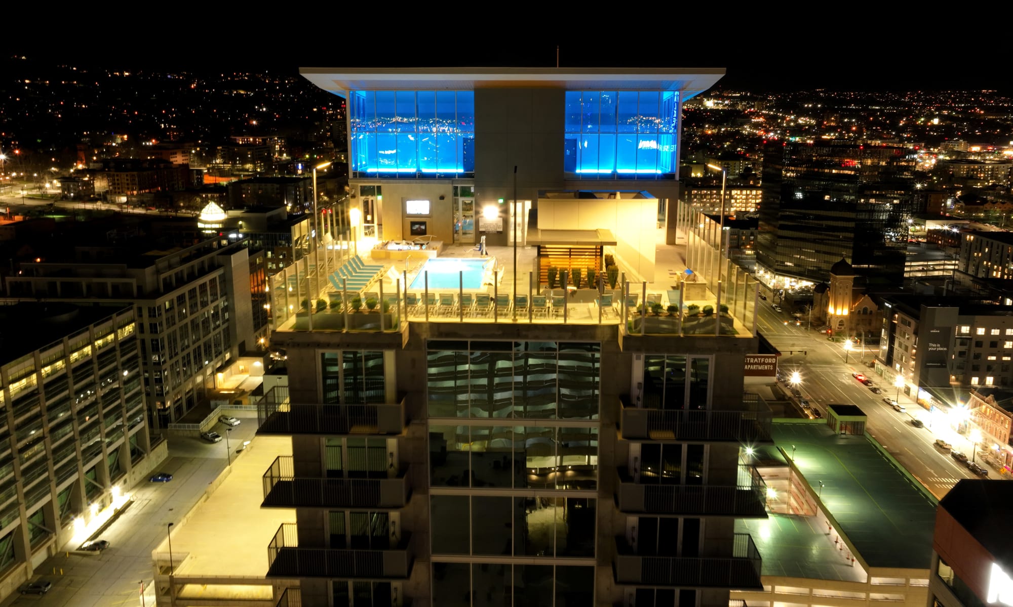 View of 21st floor amenities at night from the west side at Luxury high-rise community of Liberty SKY in Salt Lake City, Utah