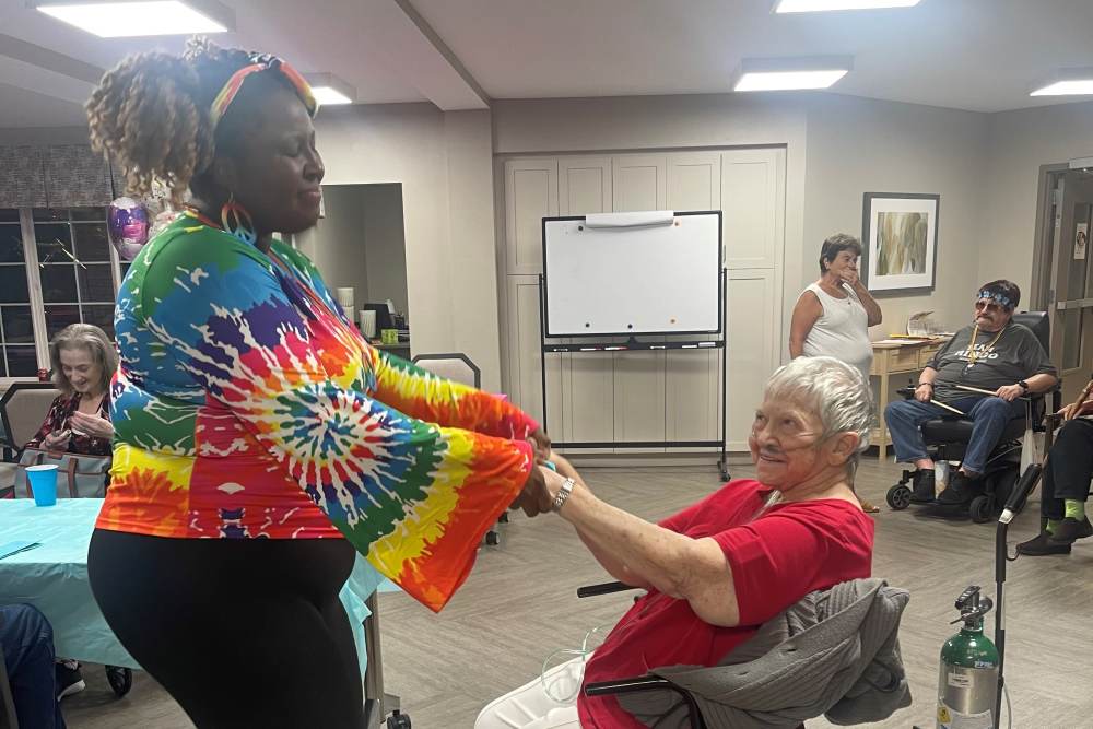 Caregiver with resident at Lighthouse Pointe by Barclay House in Chesapeake, Virginia