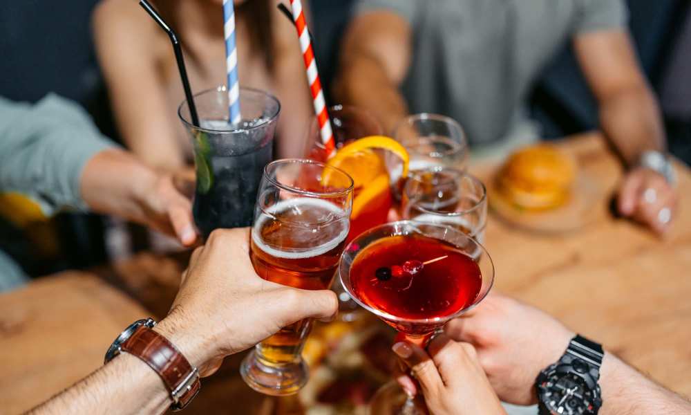 Resident having drink at bar near Willow Brook Townhomes in Bossier City, Louisiana