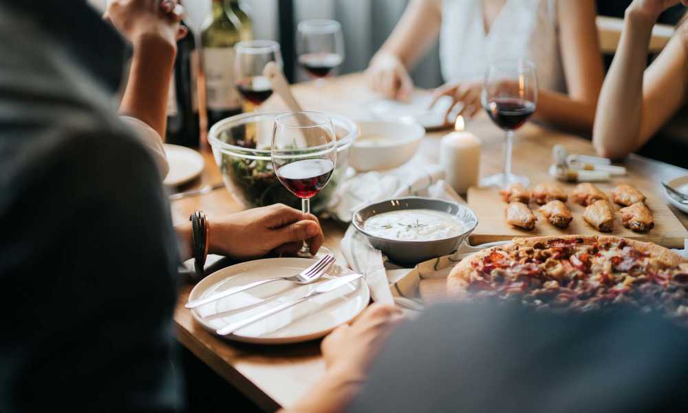 Resident enjoying some wine and fine dining at restaurant near Willow Brook Townhomes in Bossier City, Louisiana 