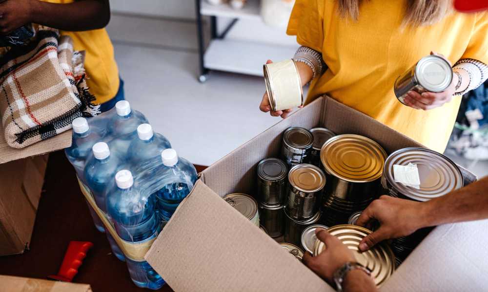Boxes of water and tin cans at 300 North Apartments in Baltimore, Maryland