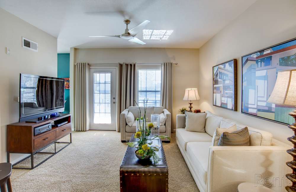 Living room with a couch at Highland Hills Apartments in Dothan, Alabama