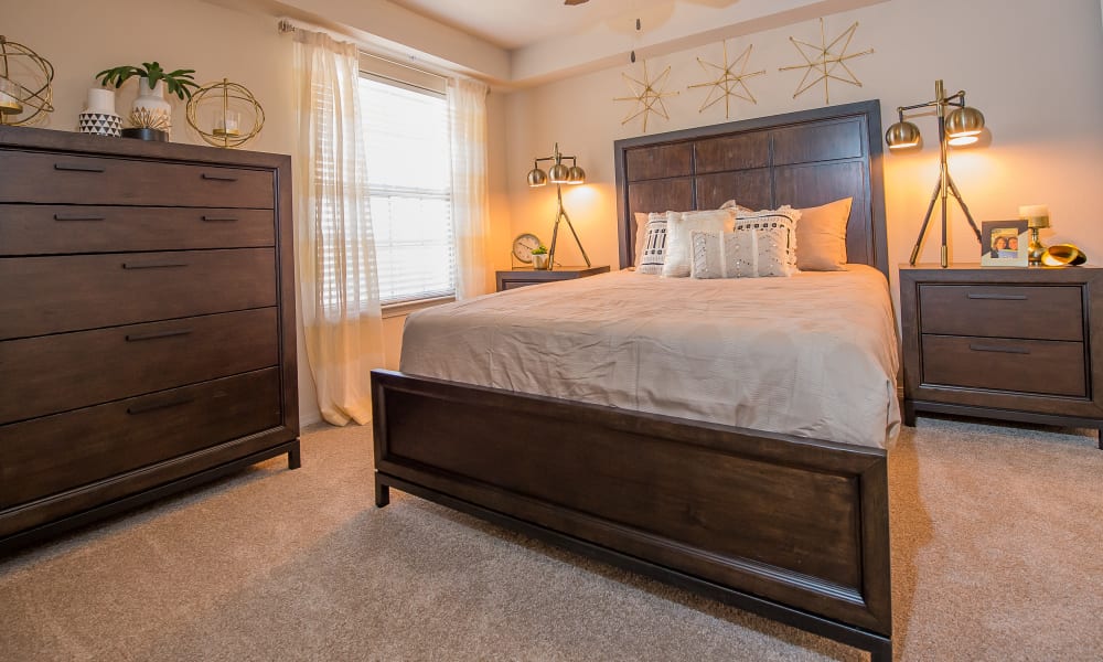 Cozy bedroom at Watercress Apartments in Maize, Kansas