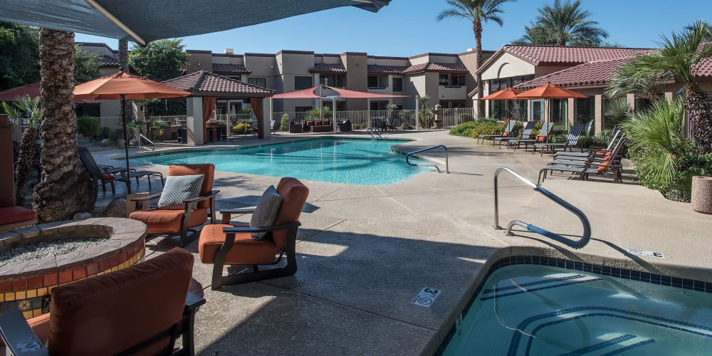 Comfortable poolside seating at Scottsdale Highlands Apartments in Scottsdale, Arizona