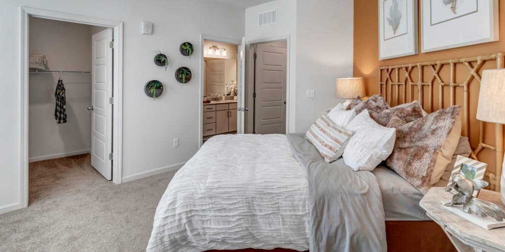 Model home bedroom with attached bathroom at Tapestry Westland Village in Jacksonville, Florida
