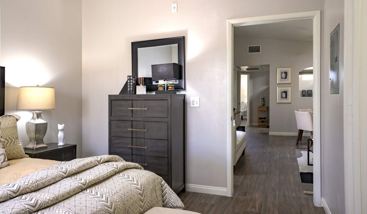 Master bedroom with wood floors at La Serena at the Parque in North Las Vegas, Nevada