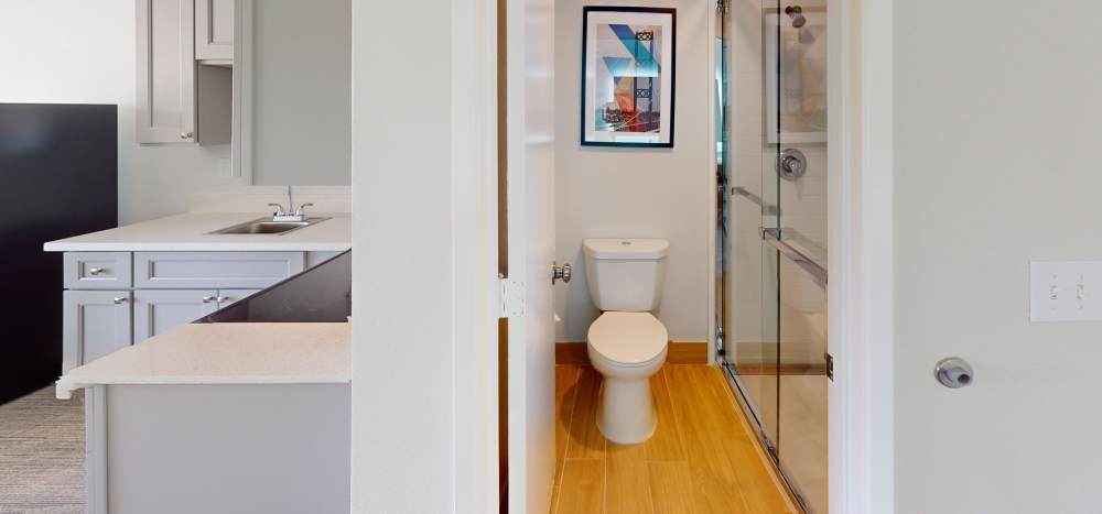 Bathroom with modern fixtures at Thea Apartments in Tacoma, Washington